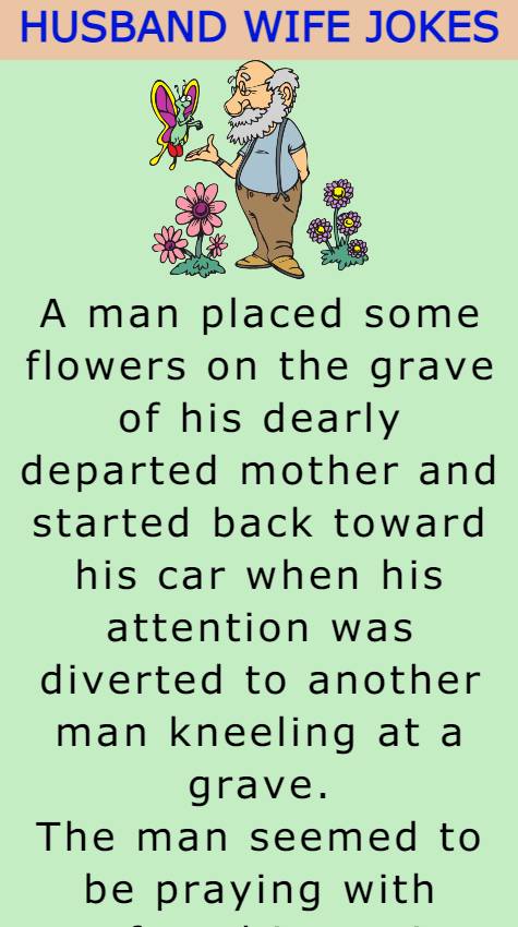 A man placed some flowers on the grave